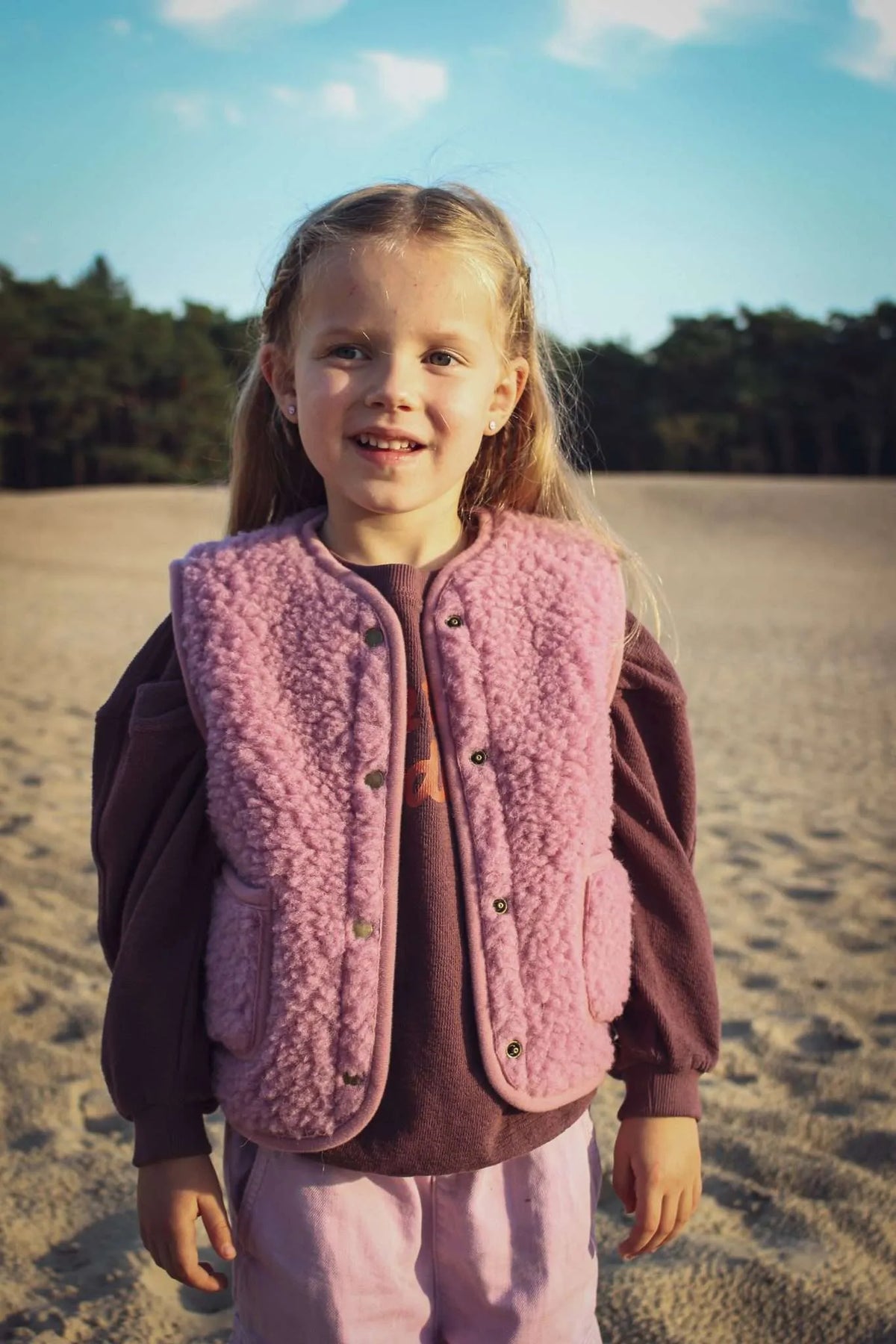 Cocoon enfant, le gilet sans manche en laine mérinos rose poudré
