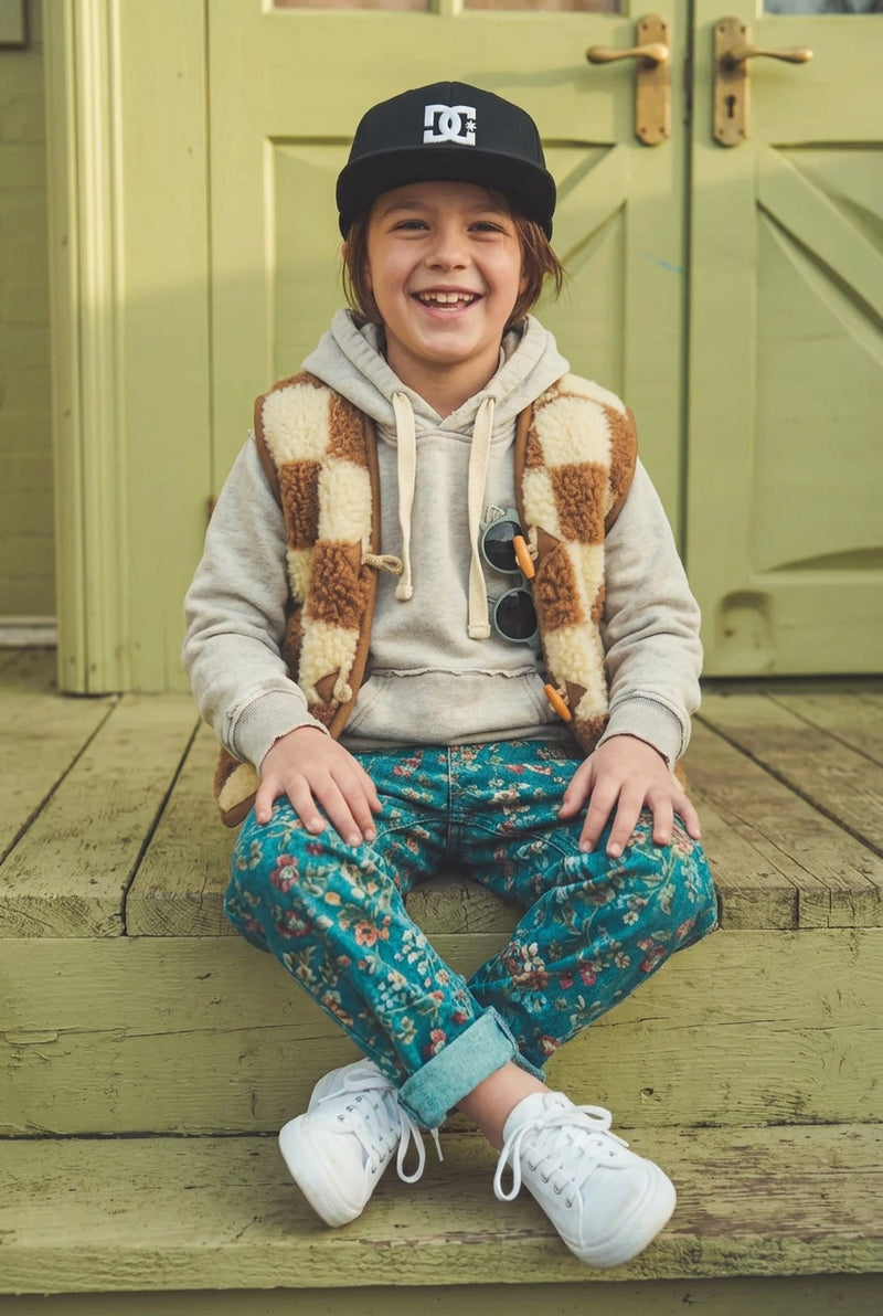 Louve enfant, le gilet sans manche en laine mérinos damier